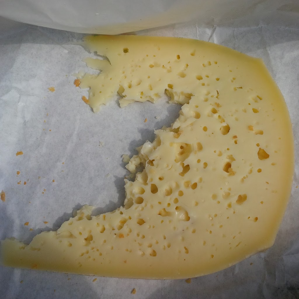 A slab of Asiago cheese - Veneto, Italy - rossiwrites.com