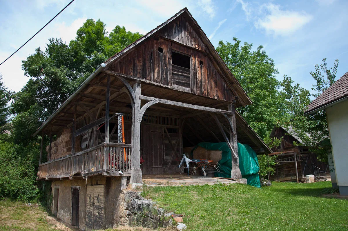 A traditional Slovenian wooden barn - kozolec, Bela Krajina, Slovenia - www.rossiwrites.com