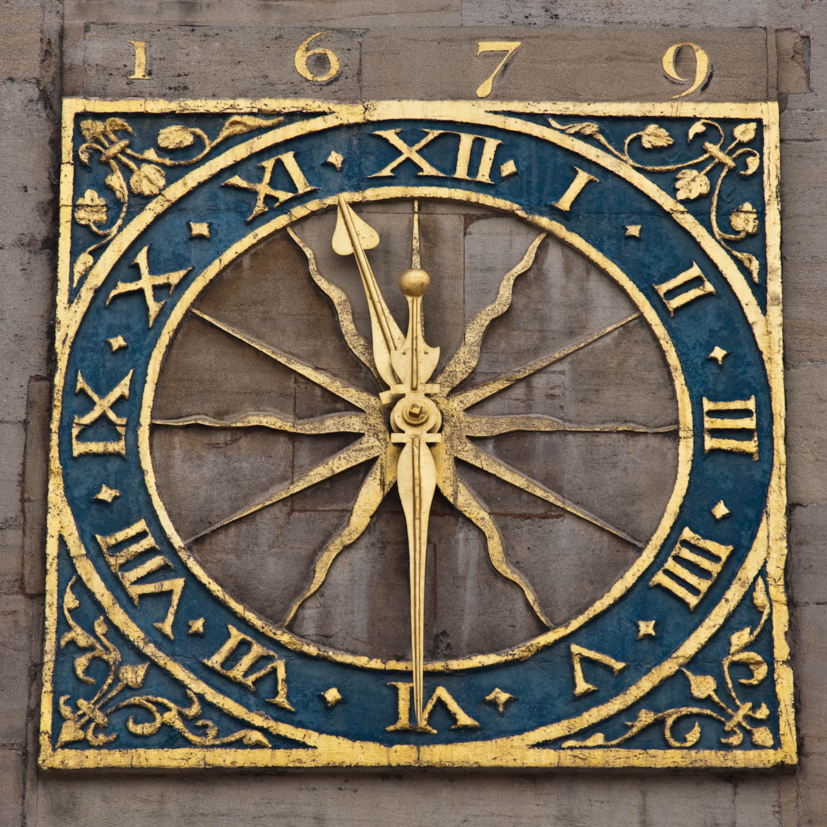 The Cambridge University Clock, set above the West door of Great St Mary's, Cambridge, England - www.rossiwrites.com