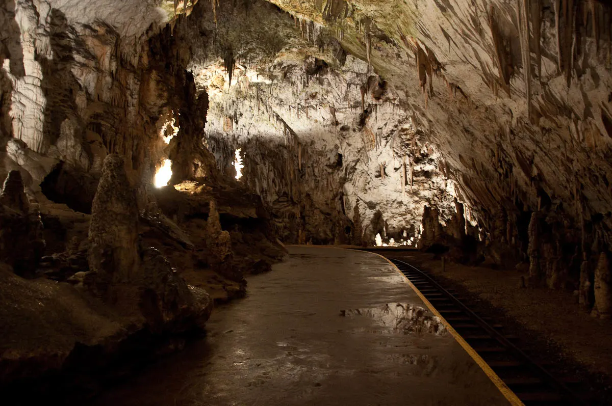 The cave train track, Postojna Caves, Slovenia - www.rossiwrites.com