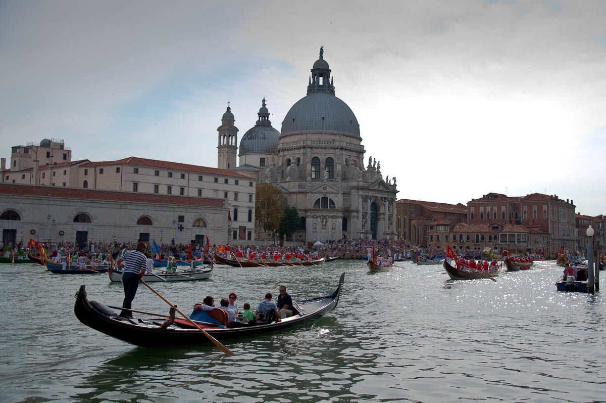 A gondola and boats in front of Santa Maria della Salute, Historical Regatta, Venice, Italy - www.rossiwrites.com