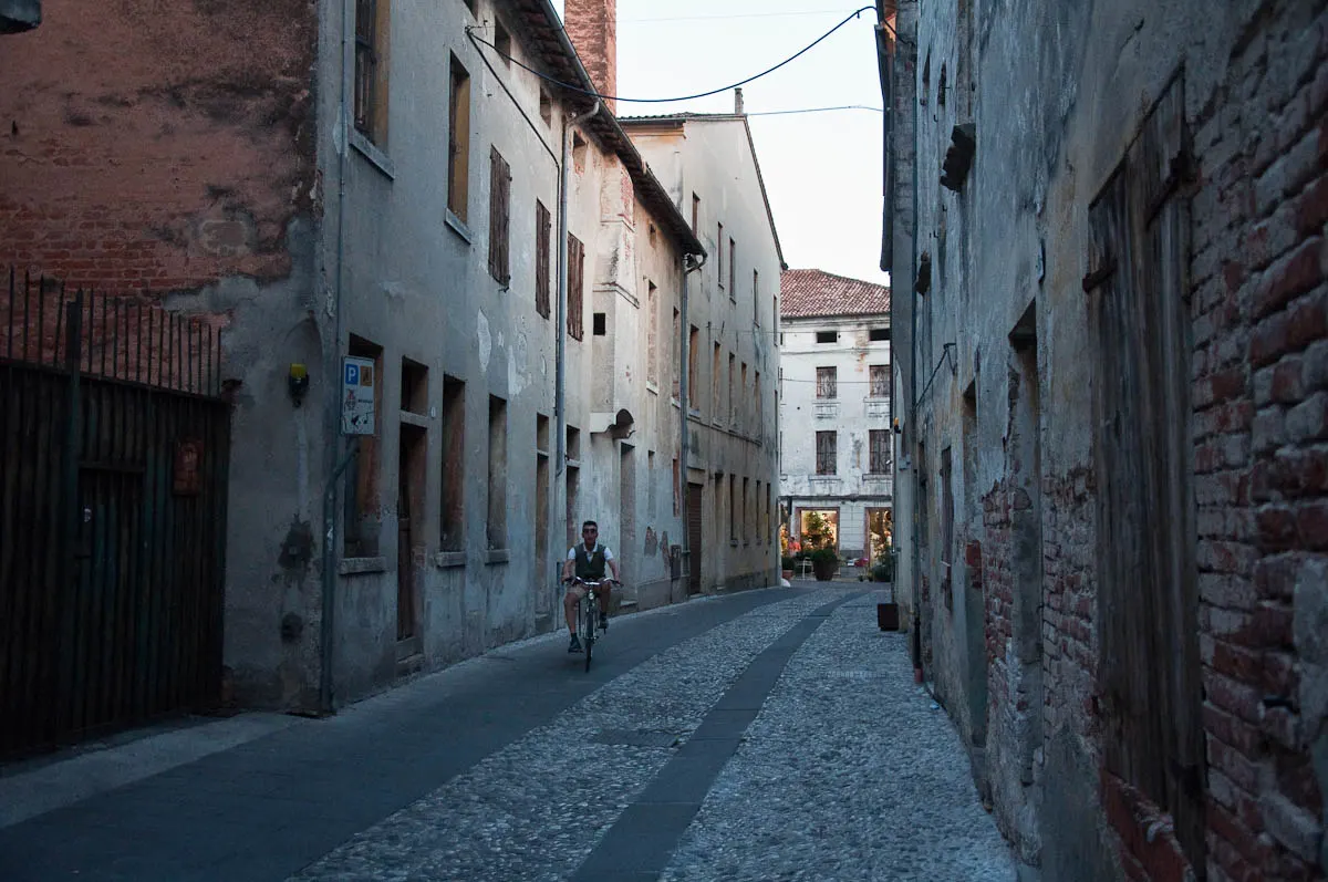 Street with a cyclist, Mediaevil Fair, Castelfranco Veneto, Italy - www.rossiwrites.com