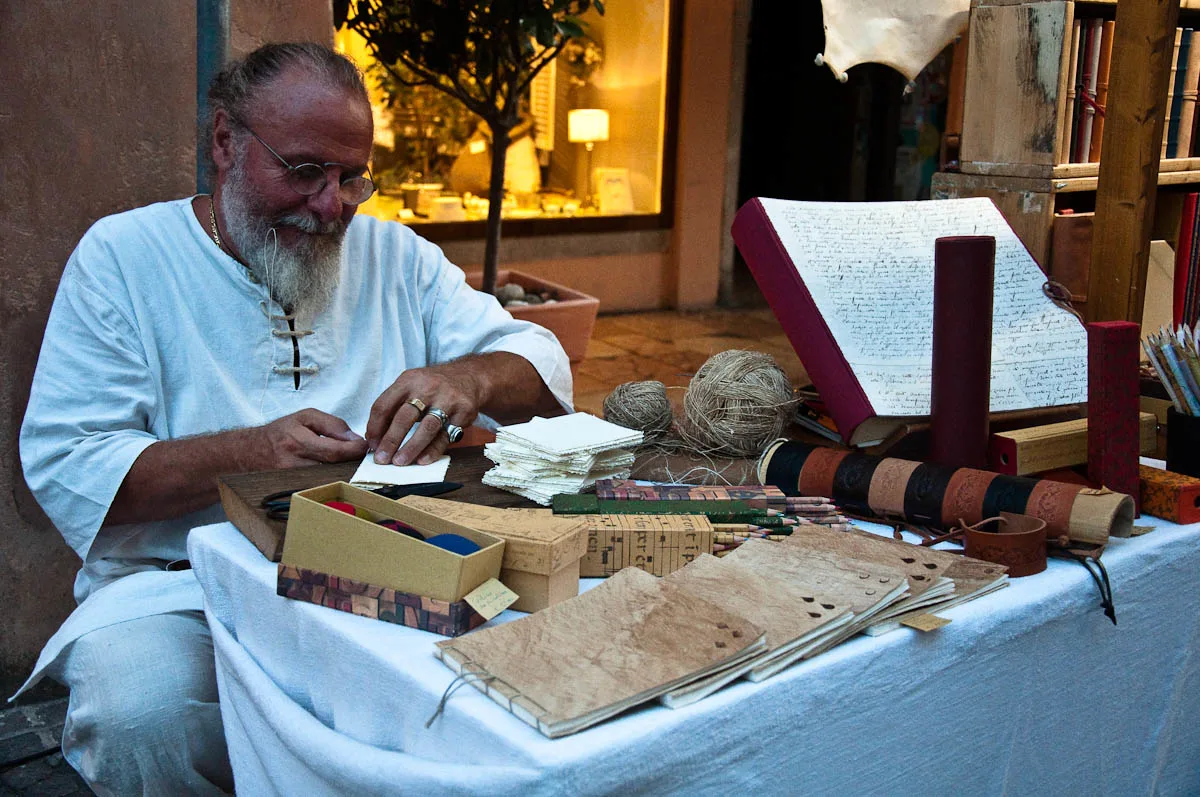 The bookbinder at work, Mediaevil Fair, Castelfranco Veneto, Italy - www.rossiwrites.com