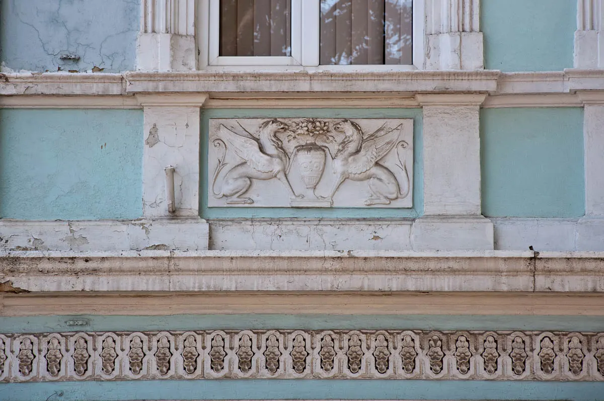 facade-ornamentation-dilapidated-light-blue-house-varna-bulgaria-www.rossiwrites.com