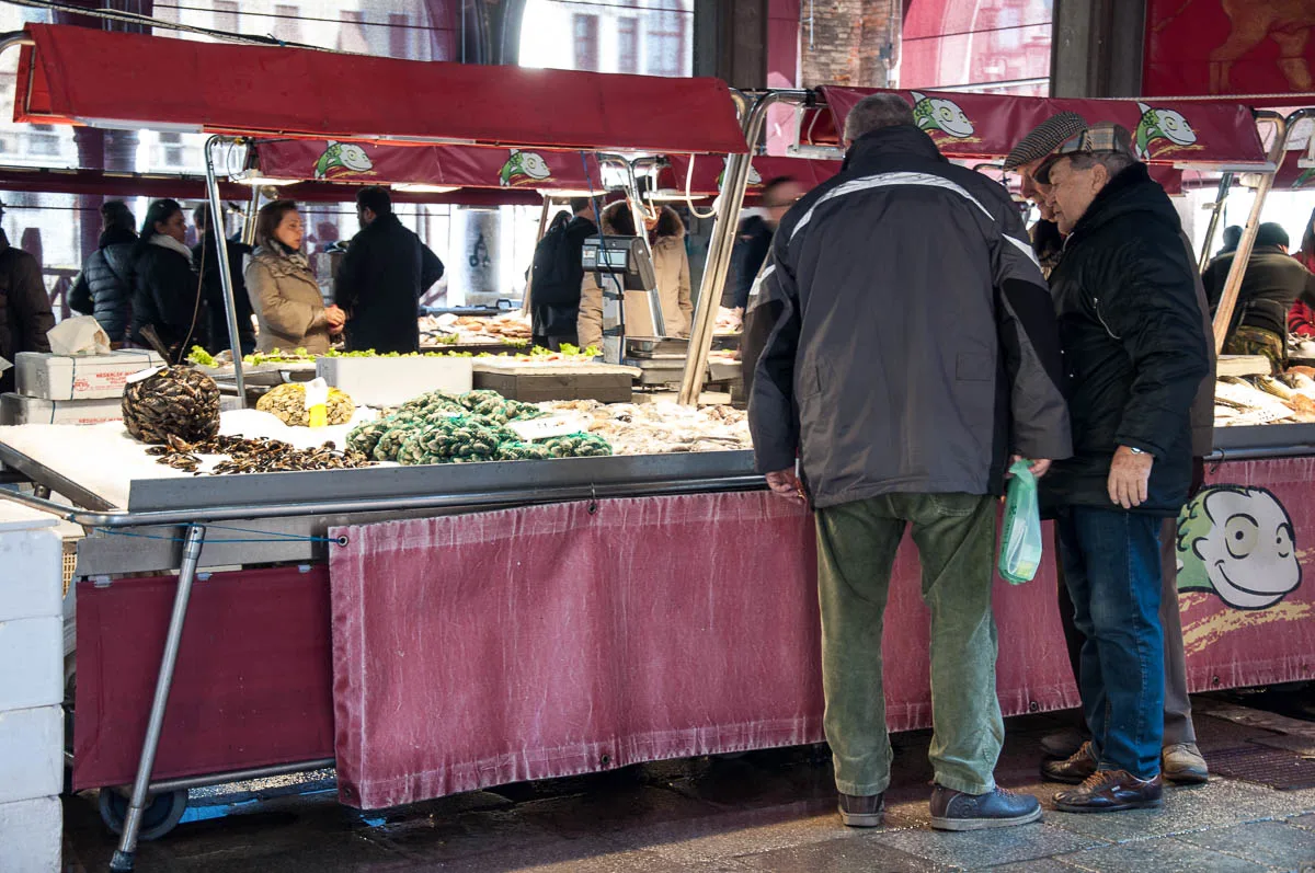 Venetians shopping for fish - Rialto Fish Market, Venice, Italy - www.rossiwrites.com