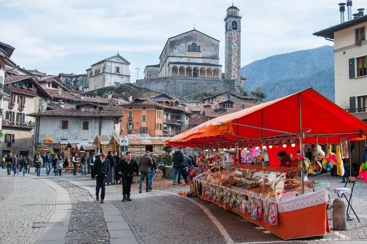 The high street with an orange sweets stall - Bagolino, Lombardy, Italy - www.rossiwrites.com
