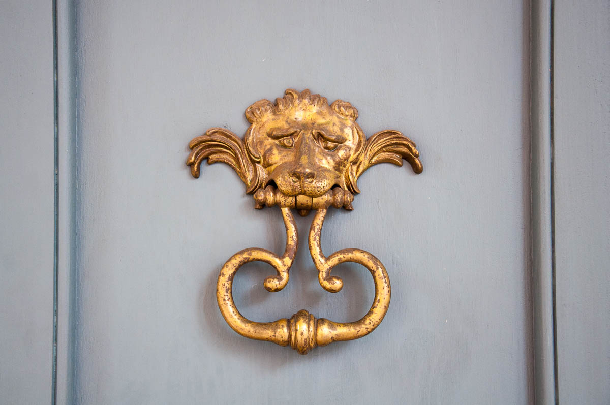 The lion-head door knocker at Teatro Alighieri - Ravenna, Italy - www.rossiwrites.com
