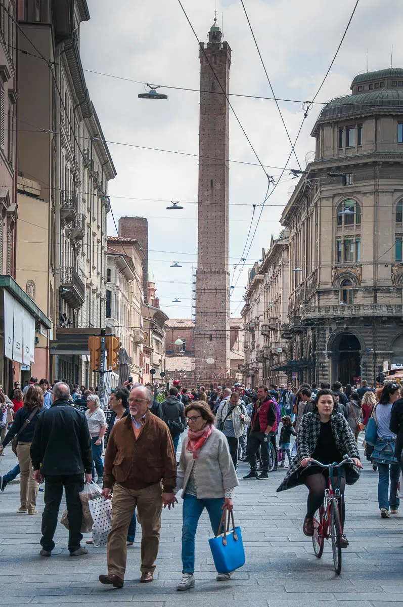 Bologna's busy streets with the Tower of Asinelli - Bologna, Emilia-Romagna, Italy - www.rossiwrites.com