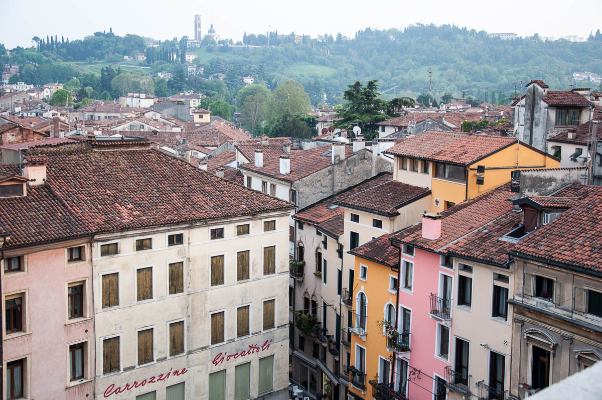 Colourful houses with Monte Berico in the distance - seen from Palladio's Basilica, Vicenza , Italy - www.rossiwrites.com