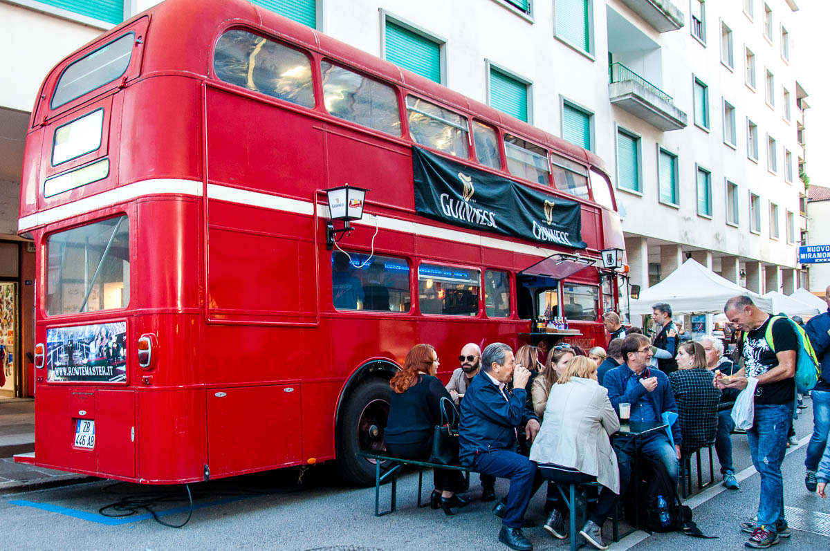 A double-decker bus serving Guiness on tap - British Day Schio - Veneto, Italy - www.rossiwrites.com