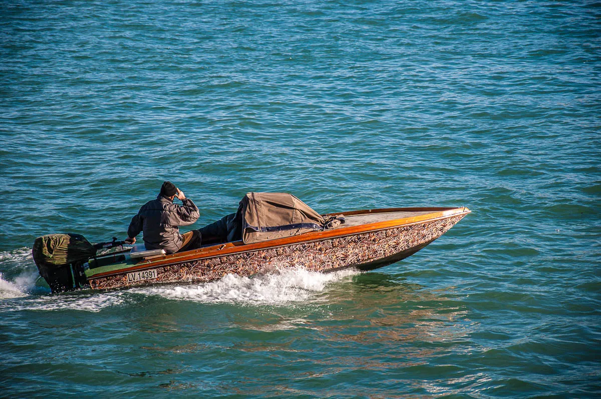 A Venetian man out and about with his boat - Venice, Veneto, Italy - www.rossiwrites.com