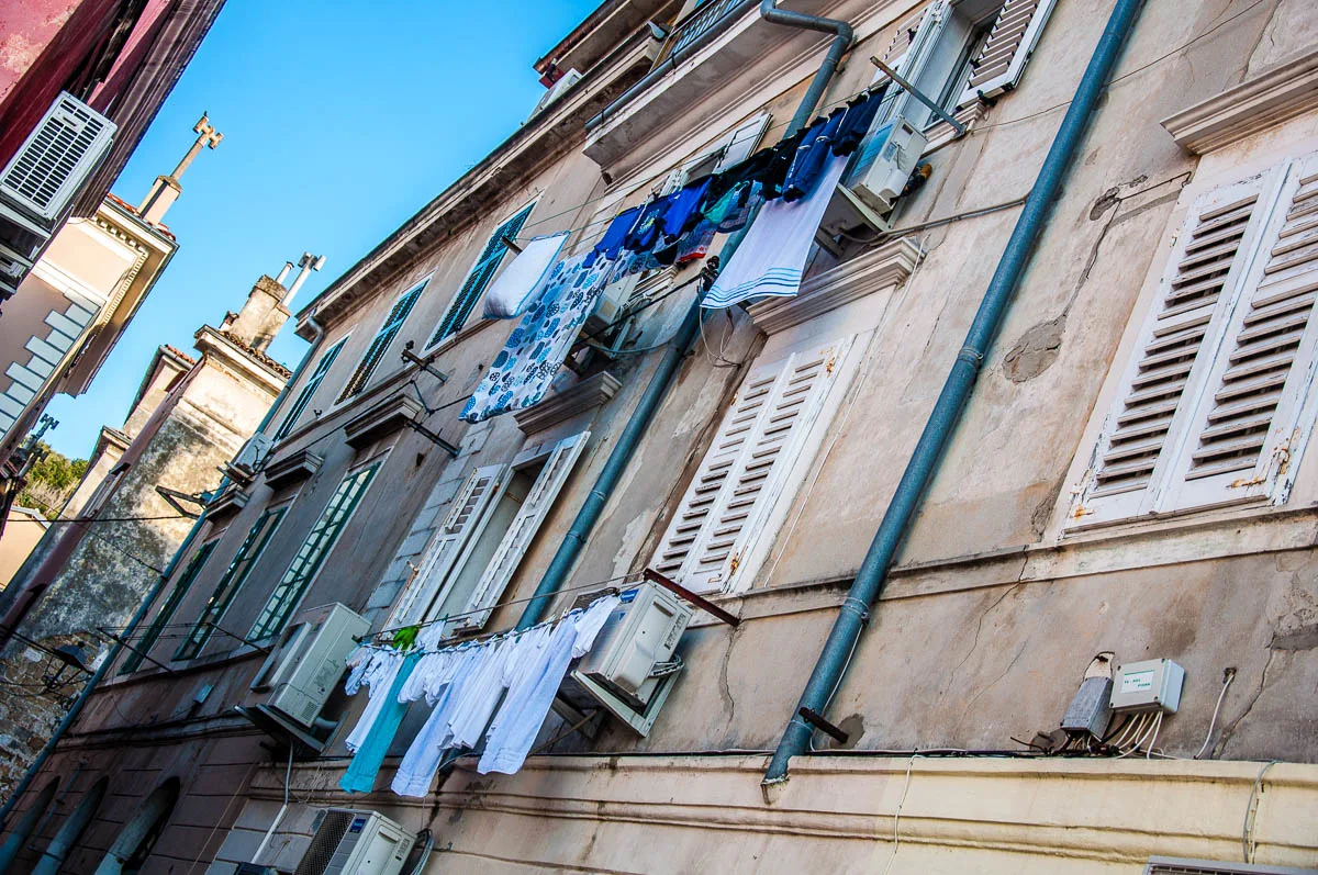 Building with laundry on the clotheslines - Piran, Slovenia - www.rossiwrites.com