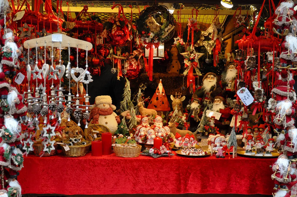 A stall selling red and white Christmas decorations - Christmas Market - Verona, Italy - rossiwrites.com