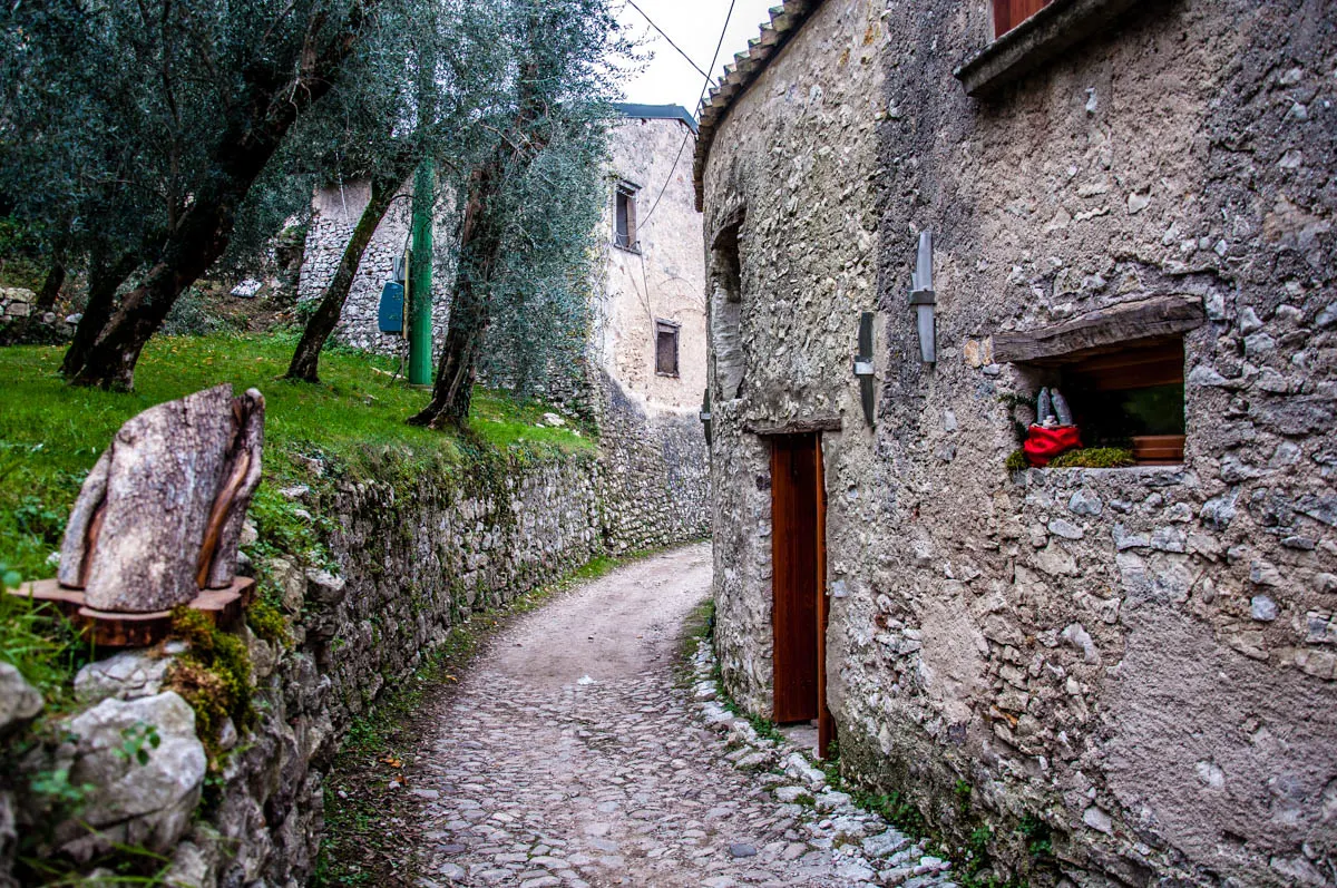 The cobbled path leading into the medieval village - Campo di Brenzone, Lake Garda, Italy - www.rossiwrites.com