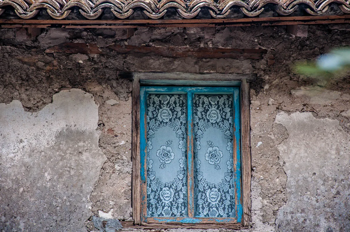 Window with lace curtains - Campo di Brenzone, Lake Garda, Italy - www.rossiwrites.com