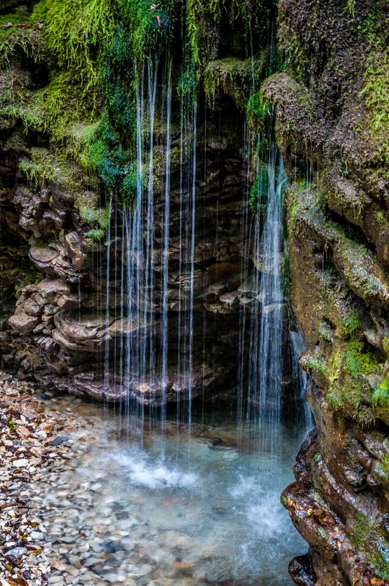 The waterfall - Grotta Azzurra di Mel - Hiking in the Dolomites - Veneto, Italy - rossiwrites.com