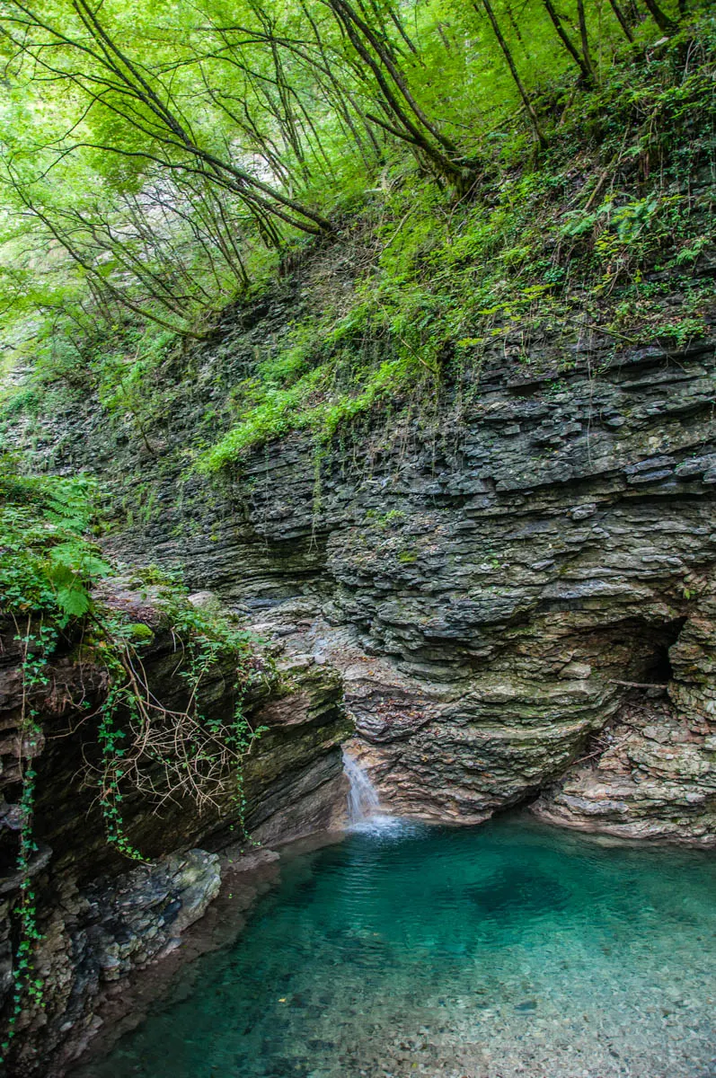 The waterfall's pond - Grotta Azzurra di Mel - Hiking in the Dolomites - Veneto, Italy - rossiwrites.com