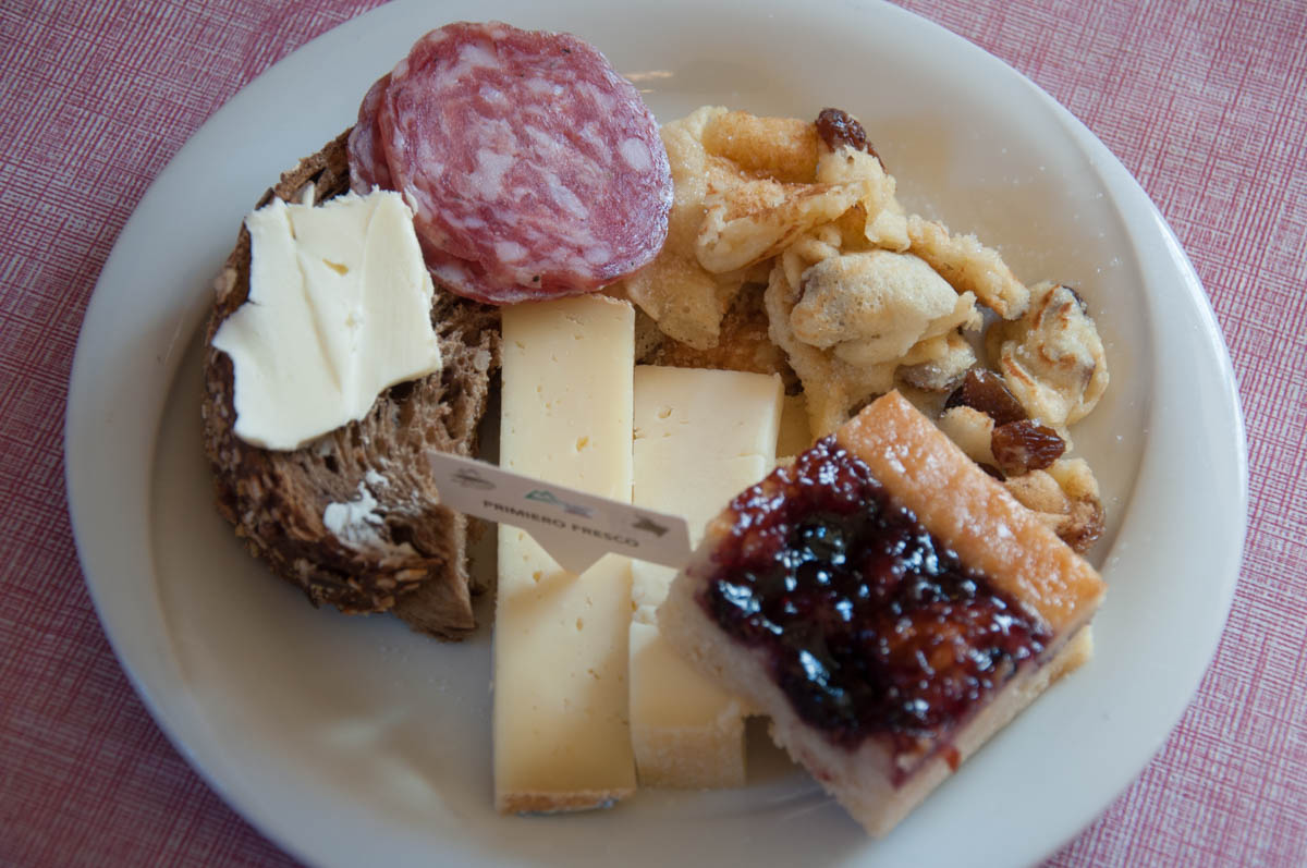 Traditional breakfast food served in Agritur Malga Rolle - Dolomites, Trentino, Italy - rossiwrites.com