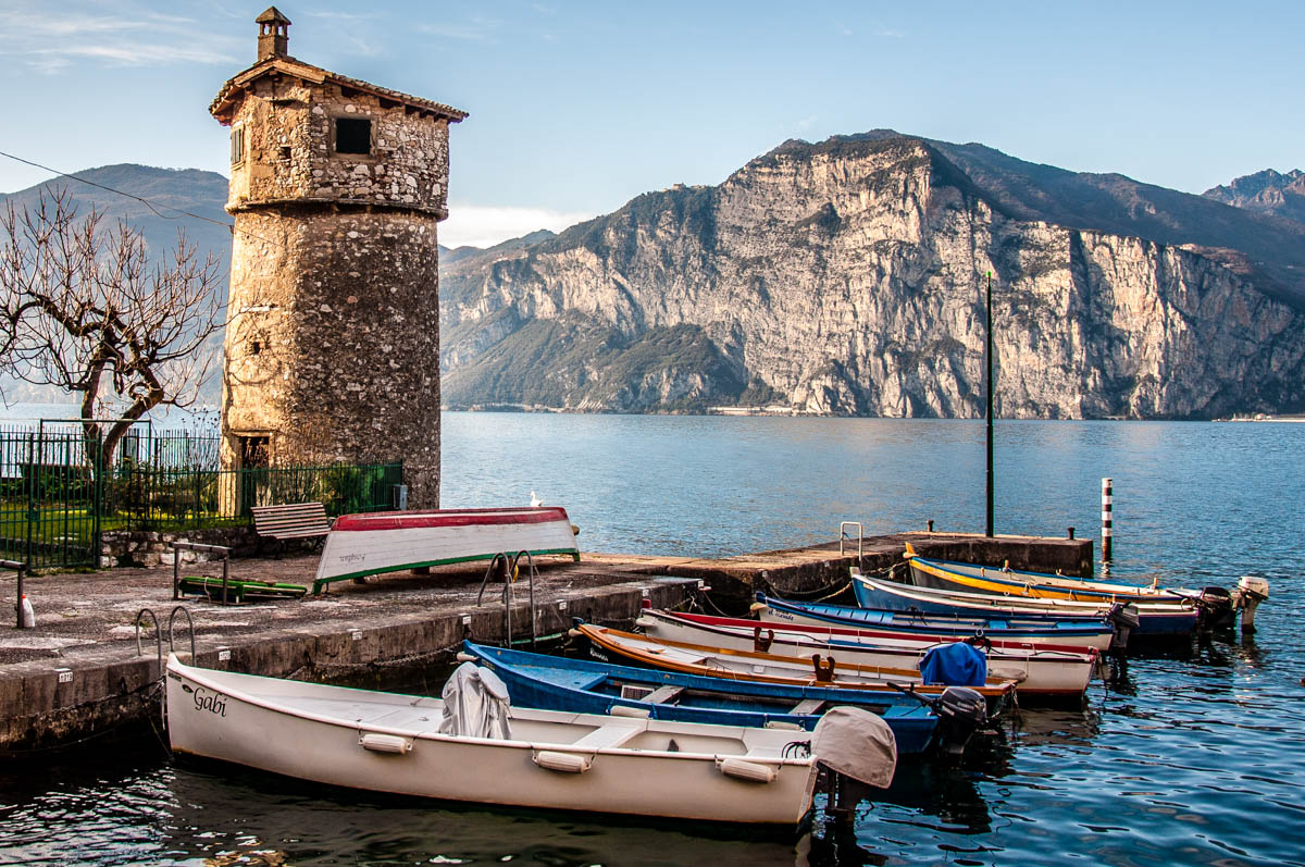 The harbour with the ancient windmill - Cassone, Lake Garda, Veneto, Italy - rossiwrites.com
