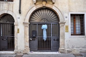 A child is born - a blue bow decorates the entrance door of a house in Vicenza signaling that a baby boy has been borne into the home