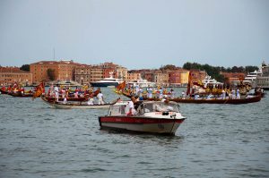 A water ambulance passing by before the start of the parade, Historical Regatta, Venice, Italy - www.rossiwrites.com