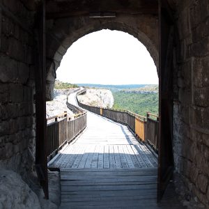 The wooden bridge seen through the gate, Ovech Fortress, Provadia, Bulgaria - www.rossiwrites.com