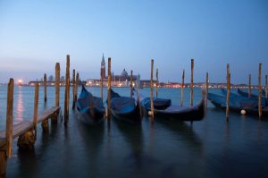 Gondolas and the island of San Giorgio Maggiore early in the morning - Venice, Italy - rossiwrites.com