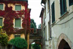The arched entrance leading into the heart of Asolo, Veneto, Italy - www.rossiwrites.com
