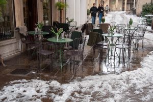 A cafe's outside seating area in the snow - Vicenza, Veneto, Italy - www.rossiwrites.com
