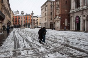 Piazza dei Signori with people walking in the snow - Vicenza, Veneto, Italy - www.rossiwrites.com