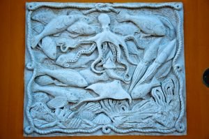Marine bas-relief on the wall of a house - Chioggia, Veneto, Italy - www.rossiwrites.com