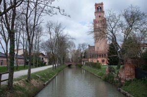 The bell tower Torre dei Preti and the moat - Noale, Veneto, Italy - www.rossiwrites.com