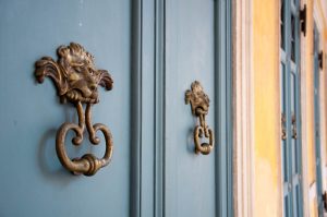 The lion-head door knockers at Teatro Alighieri - Ravenna, Italy - www.rossiwrites.com