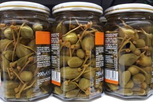 Jars with pickled caperberries - Vicenza, Veneto, Italy - www.rossiwrites.com