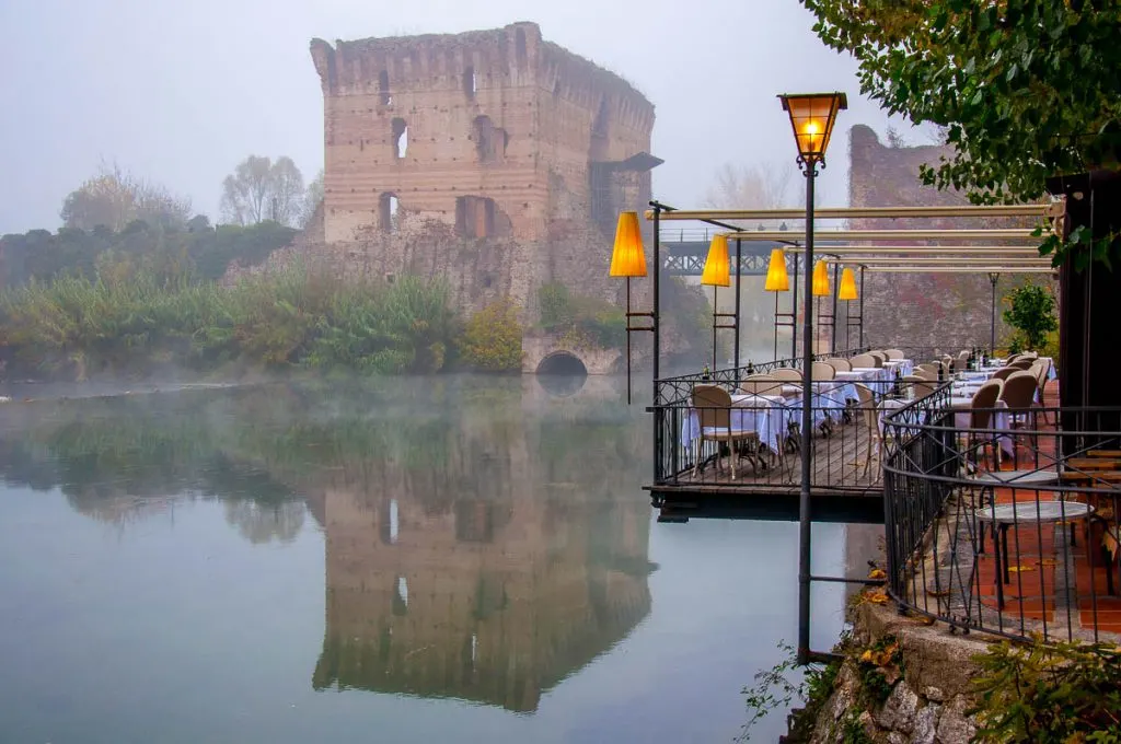 The 14th-century Visconti bridge in the fog - Borghetto, Valeggio sul Mincio, Veneto, Italy - rossiwrites.com