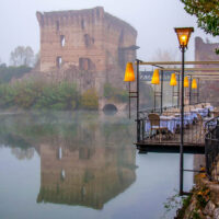 The 14th-century Visconti bridge in the fog - Borghetto, Valeggio sul Mincio, Veneto, Italy - rossiwrites.com