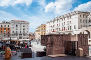 A view of Piazza della Vittoria with an antiques market - Brescia, Lombardy, Italy - www.rossiwrites.com
