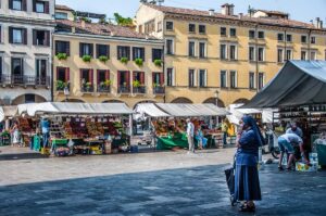 Market scene on Piazza delle Erbe - Padua, Italy - rossiwrites.com