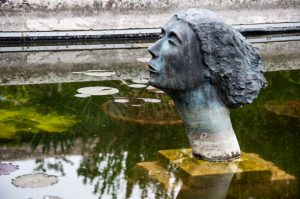The sculptural head in the pond - Castello di San Pelagio, Province of Padua, Veneto, Italy - www.rossiwrites.com