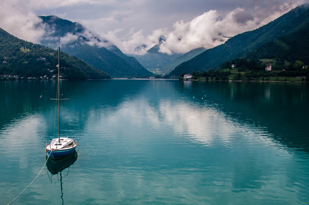 View of the pristine blue waters of Lake Ledro - Trentino, Italy - rossiwrites.com