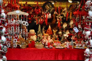 A stall selling red and white Christmas decorations - Christmas Market - Verona, Italy - rossiwrites.com