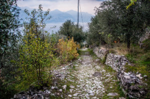 The stone-paved mule tracks with Lake Garda at the back - Campo di Brenzone, Lake Garda, Italy - www.rossiwrites.com