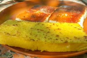 A slice of grilled polenta with grilled cheese - Osteria ai Pioppi, Veneto, Italy - www.rossiwrites.com