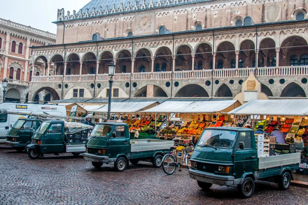 The fleet of Apes serving the daily market - Padua, Veneto, Italy - rossiwrites.com