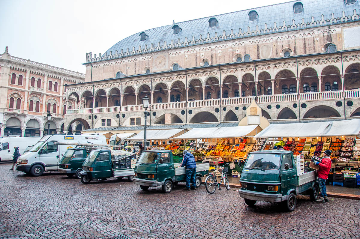 The fleet of Apes serving the daily market at Piazza delle Erbe - Padua, Veneto, Italy - rossiwrites.com