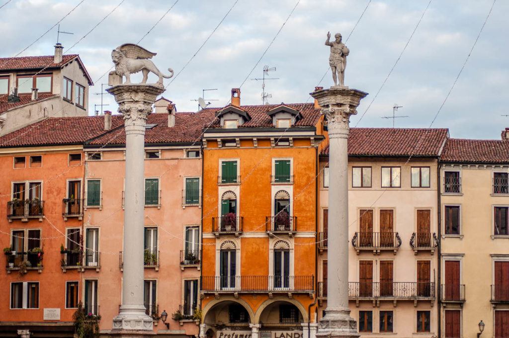 The pillars at Piazza dei Signori with Christmas lights - Vicenza, Italy - rossiwrites.com
