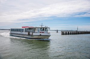 A ferry arriving at the Fusina Ferry Terminal - Venice, Italy - rossiwrites.com