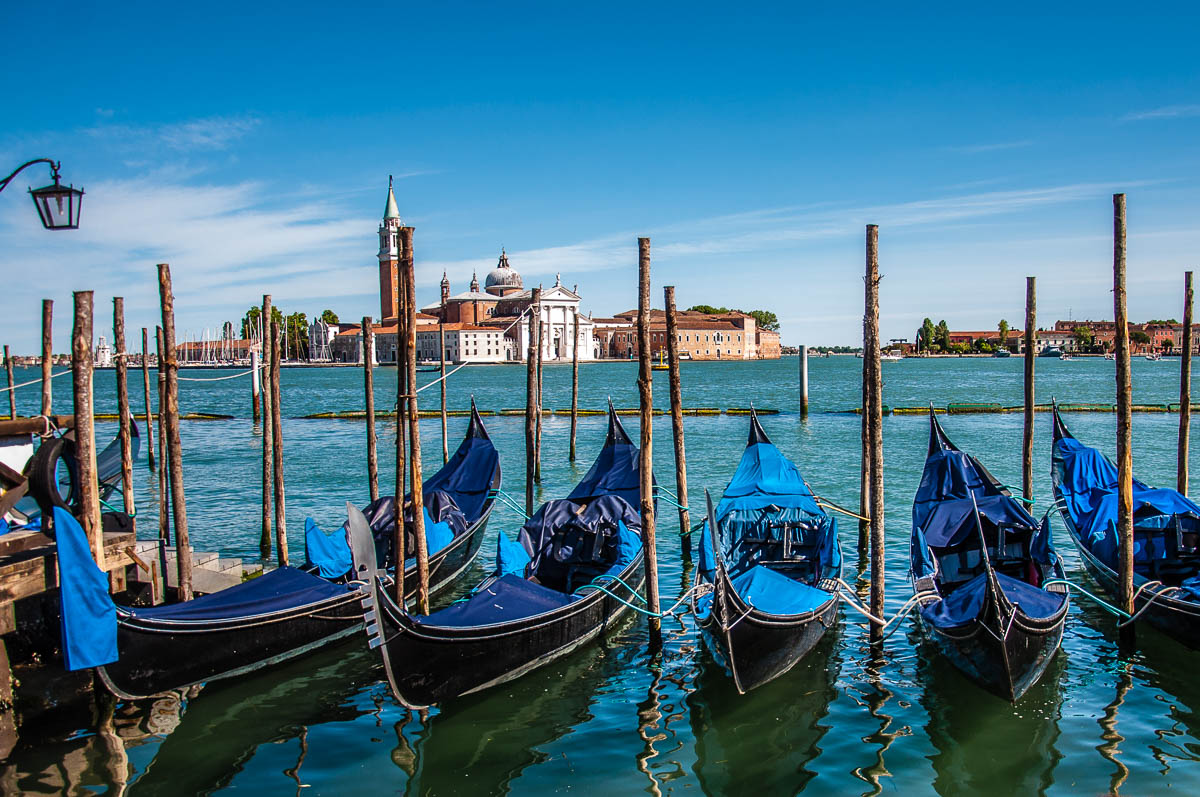 Gondolas and the island of San Giorgio Maggiore - Venice, Italy - rossiwrites.com