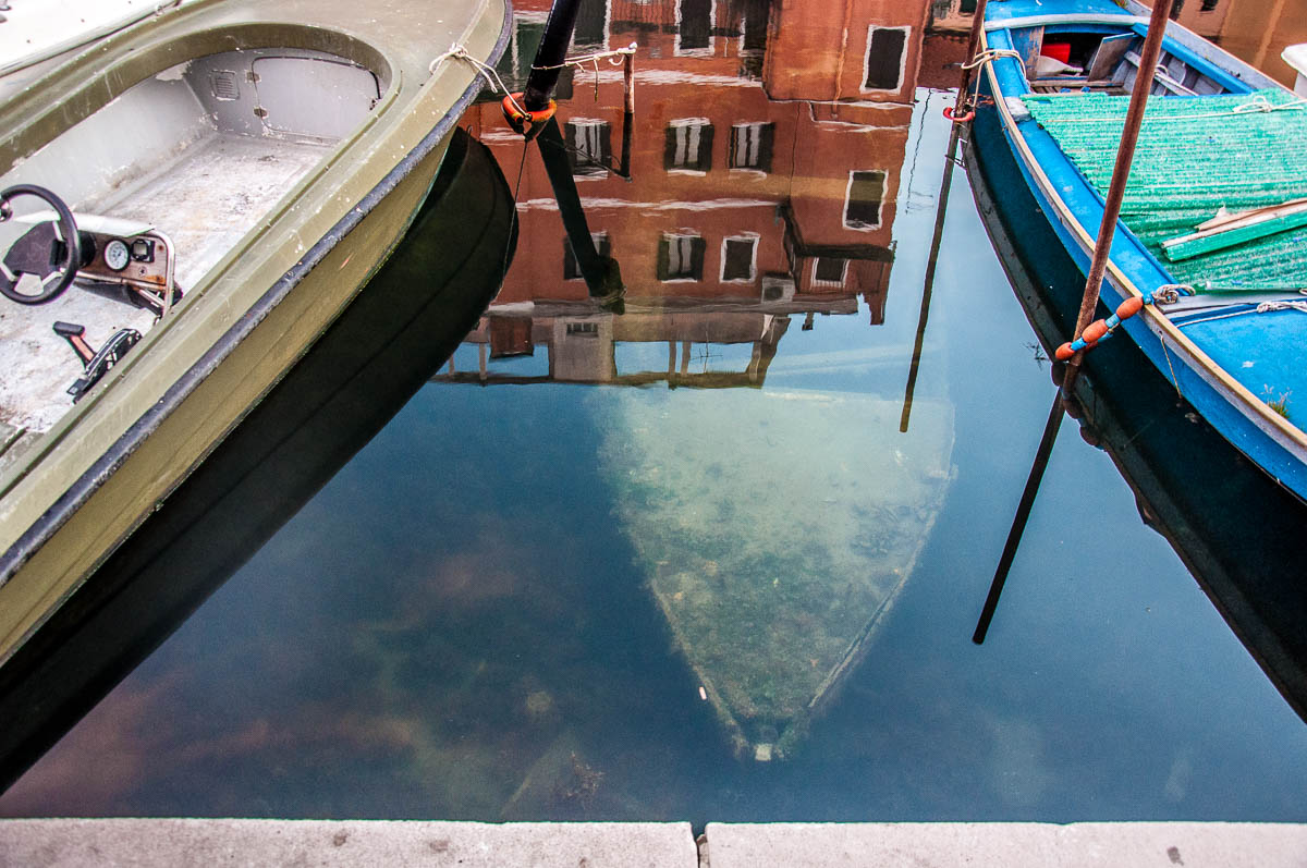 Piazzale Perotolo with a ghost boat, Chioggia - Veneto, Italy - rossiwrites.com
