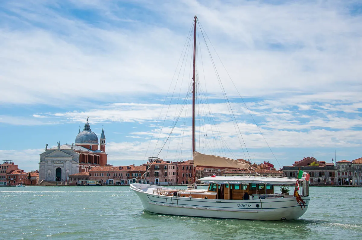 The Church of Redentore and a beautiful yacht seen from the Fondamenta delle Zattere - Venice, Italy - rossiwrites.com